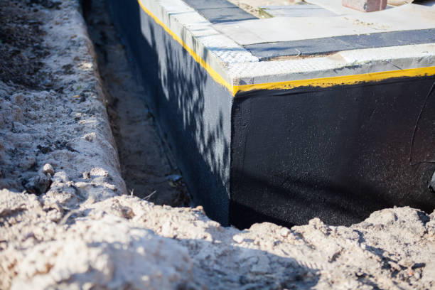 Professional Waterproofing technician working in Collegedale, TN